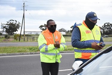 Roadblock_1 October 2020_Minister & traffic officer.jpg