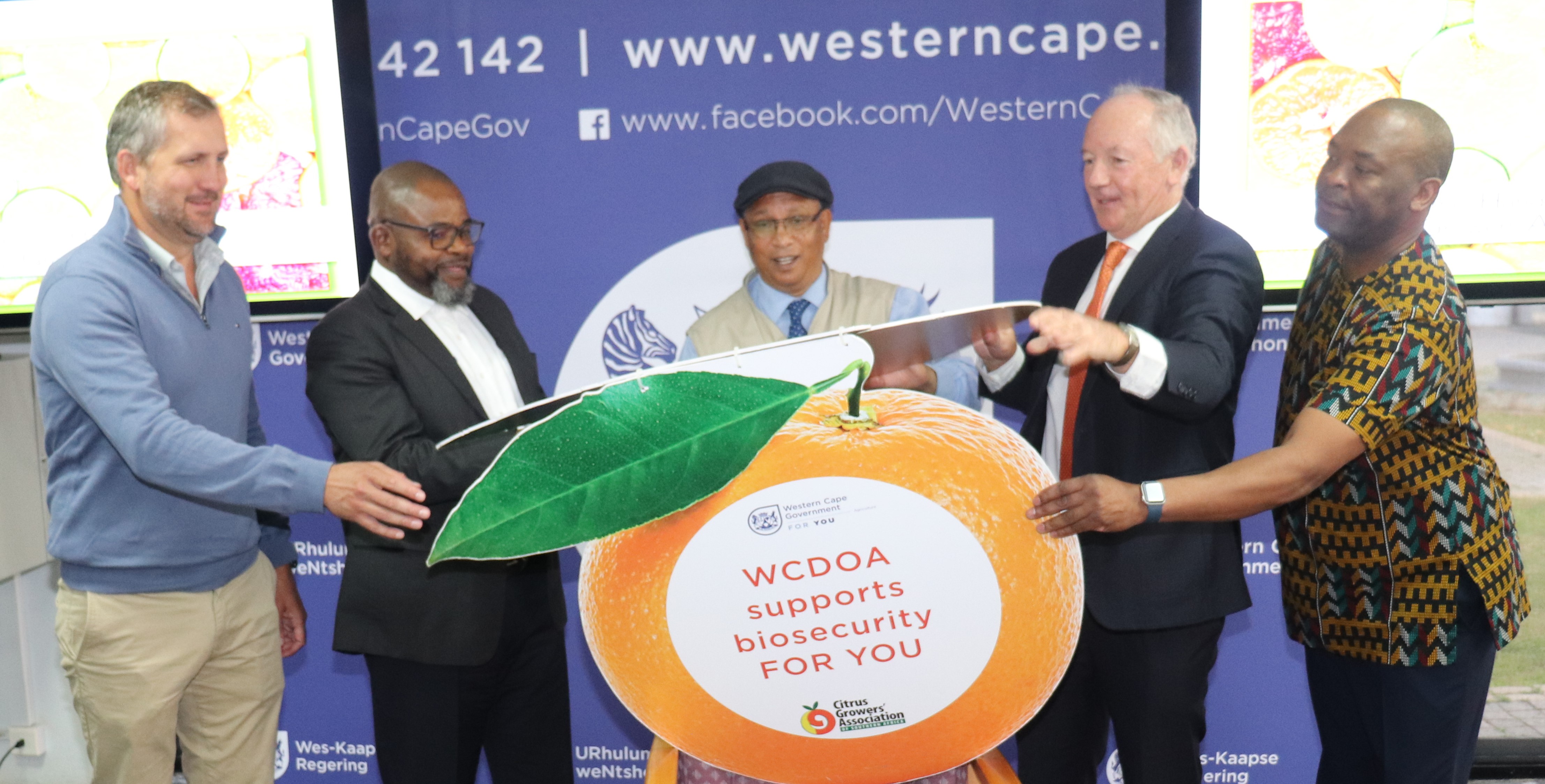 Photo – Left to right. Gerrit van der Merwe: Chairperson of the Citrus Growers Board Dr Mogale Sebopetsa: Head of Department: Western Cape Department of Agriculture Dr Ivan Meyer -  Western Cape Provincial Minister of Agriculture,  Justin Chadwick: CEO, C