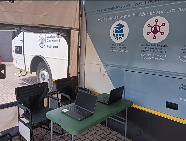 Mobile eCentre outside with side flap to accommodate special needs and shelter