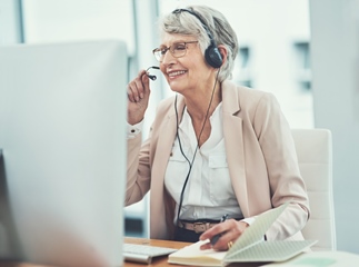 Senior woman working at a call centre