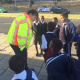 Minister Grant talking to learners about their safety at this morning's scholar transport operation.