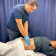 Physiotherapist, Nicholas Claasen treating back pain.